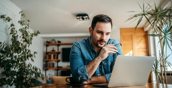 Man looking at laptop